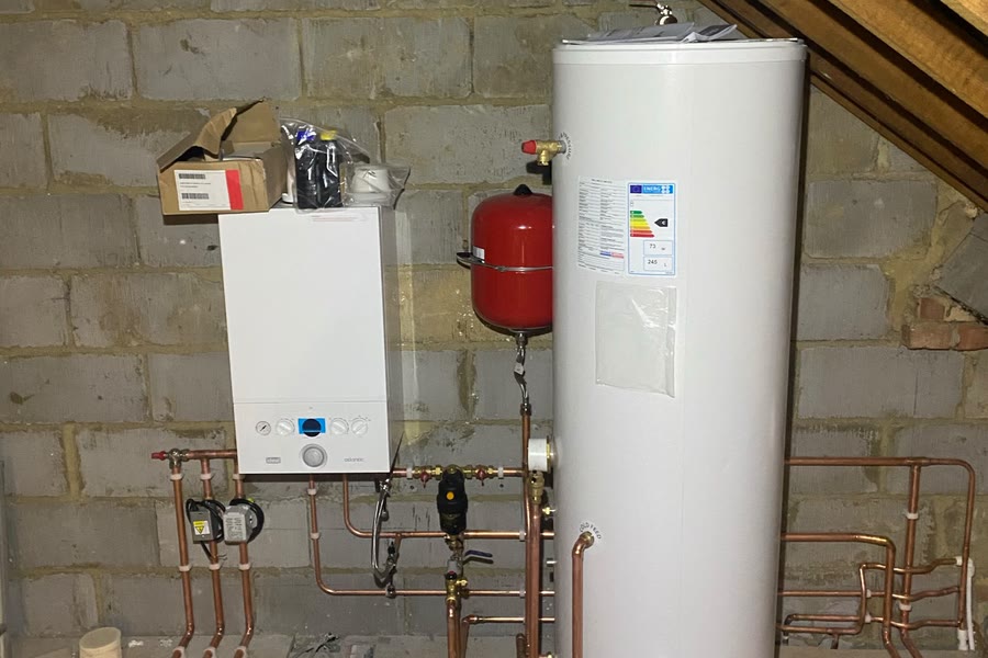 A loft installation with an Ideal boiler, 245 litre cylinder and expansion vessel