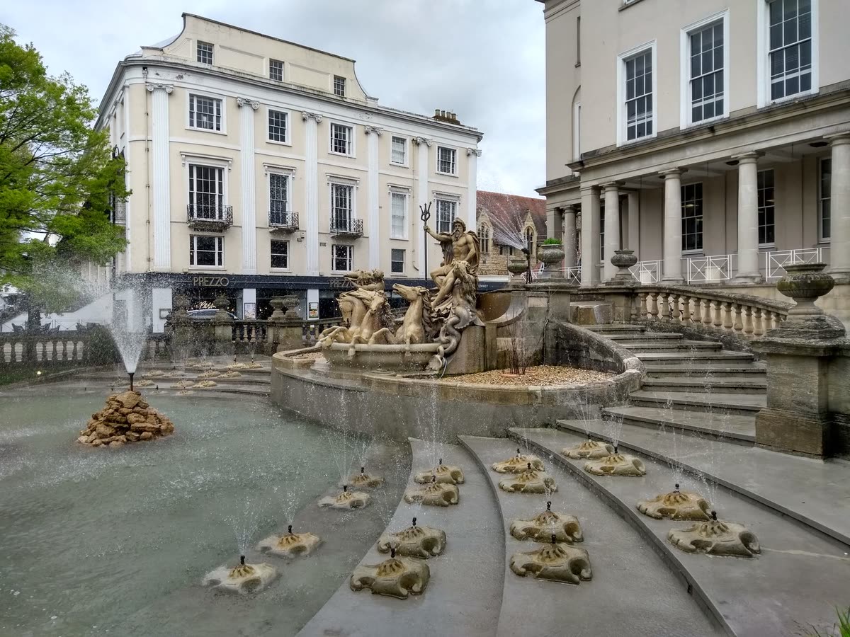 Neptune's Fountain and the Regency buildings of the Promenade in Cheltenham