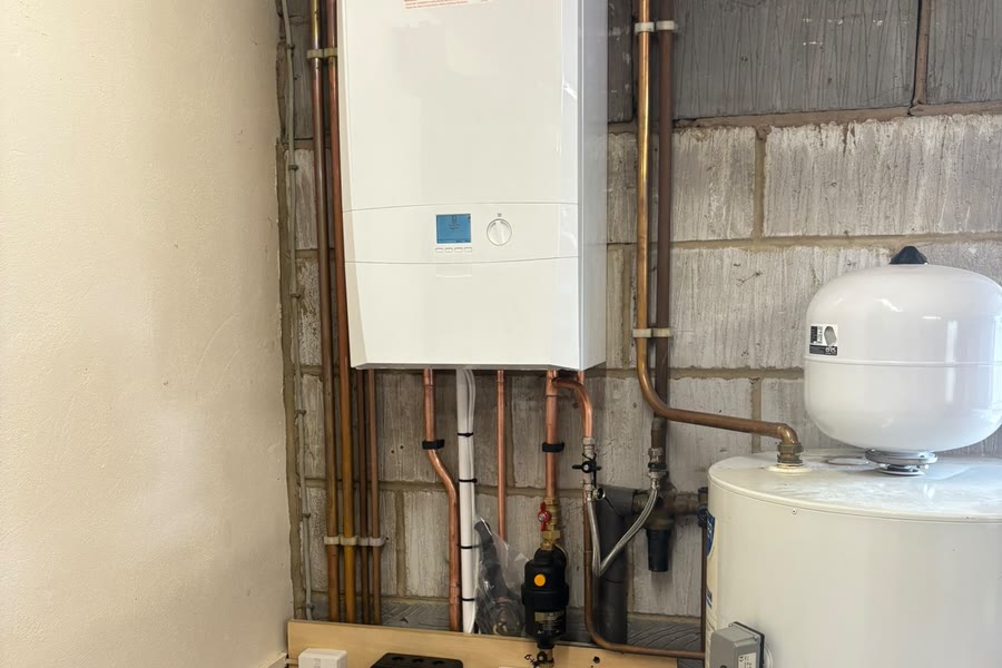 A newly fitted Ideal boiler and unvented hot water cylinder
